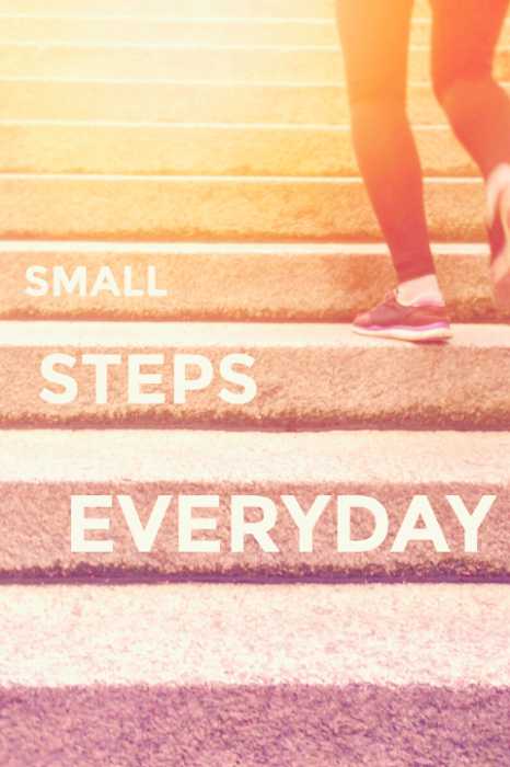 A large staircase with the words Small Steps, Everyday on them.  In life coaching, we recognize a lot of small steps add up to major change.